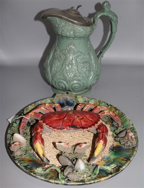 A large salt glaze jug and Palissy style dish
